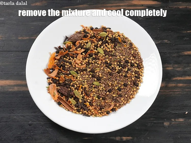 Step 13 – Switch off the flame, remove the mixture on a plate and cool completely.