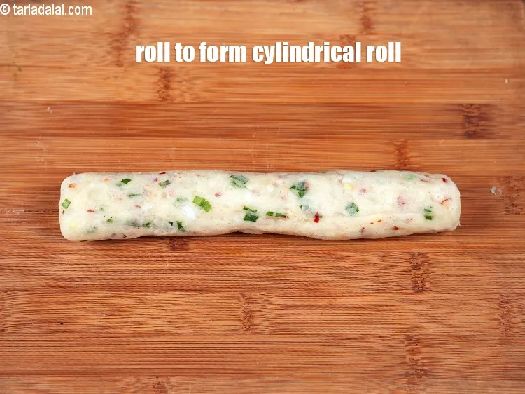 Step 13 – Roll a portion using your hands to form a long cylindrical shape roll.