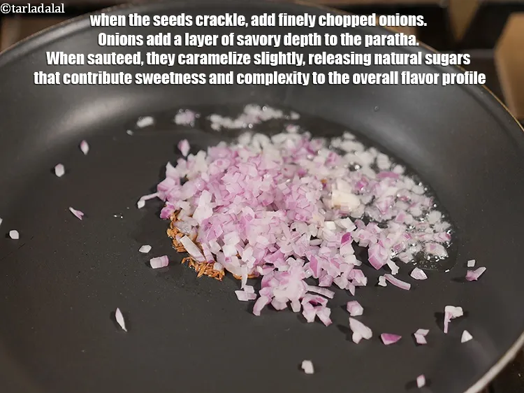 Step 14 – When the seeds crackle, add &frac14; cup finely <a href="https://www.tarladalal.com/glossary-chopped-onions-722i">chopped onions</a>. Onions add a layer …
