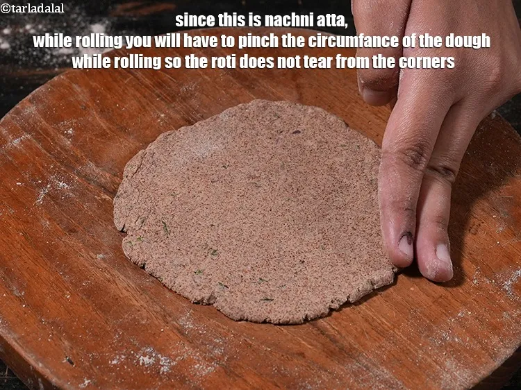 Step 30 – <meta charset="UTF-8" /> Since this is nachni atta, while rolling you will have to&nbsp;pinch&nbsp;the circumfance …