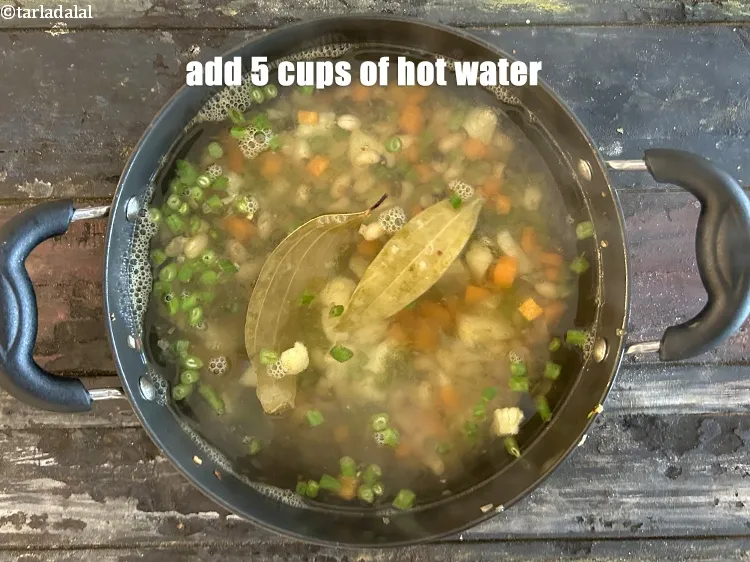 Step 19 – Add&nbsp;5 cups of <strong>hot water.</strong>