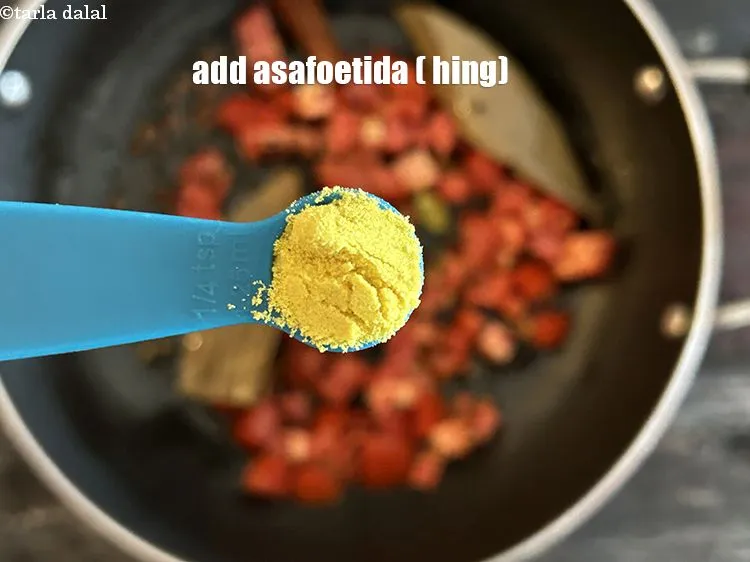 Step 13 – Add&nbsp;<meta charset="UTF-8" />1/4 tsp&nbsp;<a href="glossary-asafoetida-hing-113i">asafoetida (hing)</a>.
