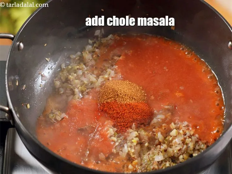 Step 13 – Add 1 tsp <a href="https://www.tarladalal.com/glossary-chole-masala-chana-masala-293i">chole masala</a>.