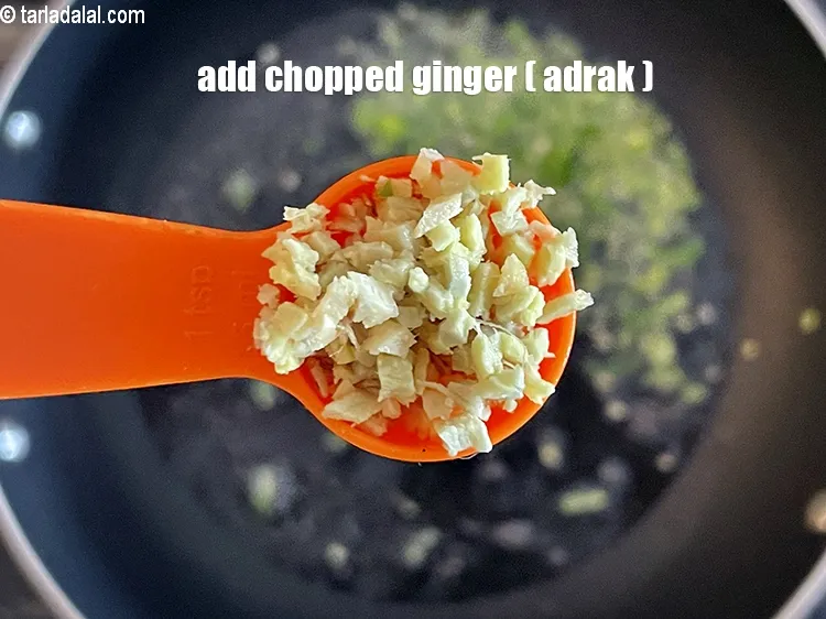 Step 26 – Add&nbsp;<meta charset="UTF-8" />1 tsp&nbsp;<a href="glossary-chopped-ginger-786i">chopped ginger (adrak)</a>.
