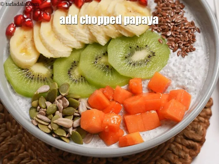 Step 13 – Add &frac14; cup <a href="https://www.tarladalal.com/glossary-chopped-papaya-836i">chopped papaya</a>.