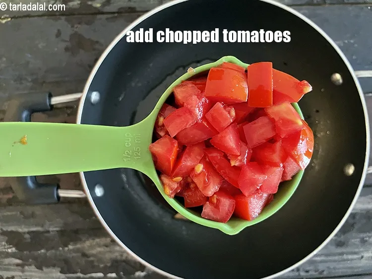 Step 18 – Add&nbsp;<meta charset="UTF-8" />1/2 cup&nbsp;<a href="glossary-chopped-tomatoes-779i">chopped tomatoes</a>.