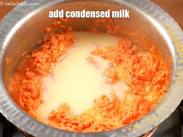 Step 13 – Add &frac12; cup <a href="https://www.tarladalal.com/glossary-condensed-milk-672i">condensed milk</a>.