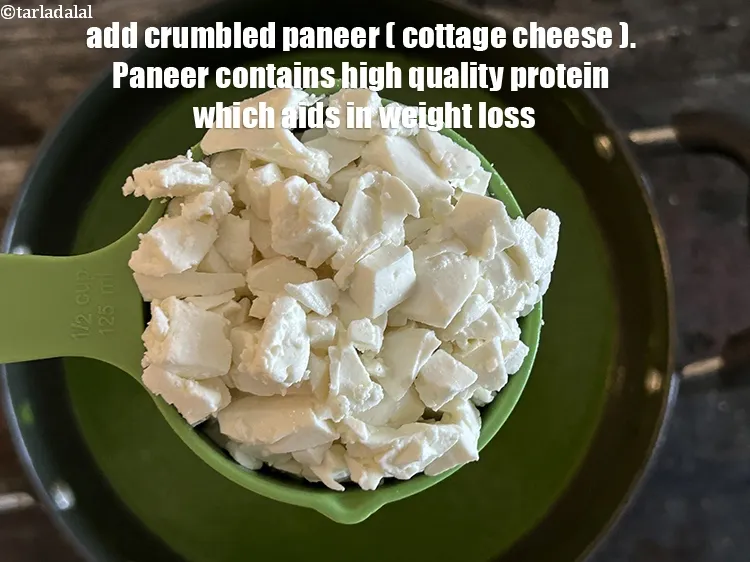 Step 14 – <html><head></head><body><p>Add&nbsp;1/2 cup&nbsp;<a href="glossary-crumbled-paneer-997i">crumbled paneer (cottage cheese)</a>.&nbsp;<a href="https://www.tarladalal.com/recipes-using-paneer-cottage-cheese-chenna-985">Paneer</a>&nbsp;contains high quality&nbsp;<a href="https://www.tarladalal.com/recipes-for-Protein-Rich-Foods-Indian-Veg-Protein-Rich-Recipes-695">protein</a>&nbsp;and&nbsp;<a href="https://www.tarladalal.com/recipes-for-Calcium-Rich-375">calcium</a>&nbsp;which aids in&nbsp;<a href="https://www.tarladalal.com/recipes-for-Healthy-Low-Calorie-Weight-Loss-383">weight loss</a>. …