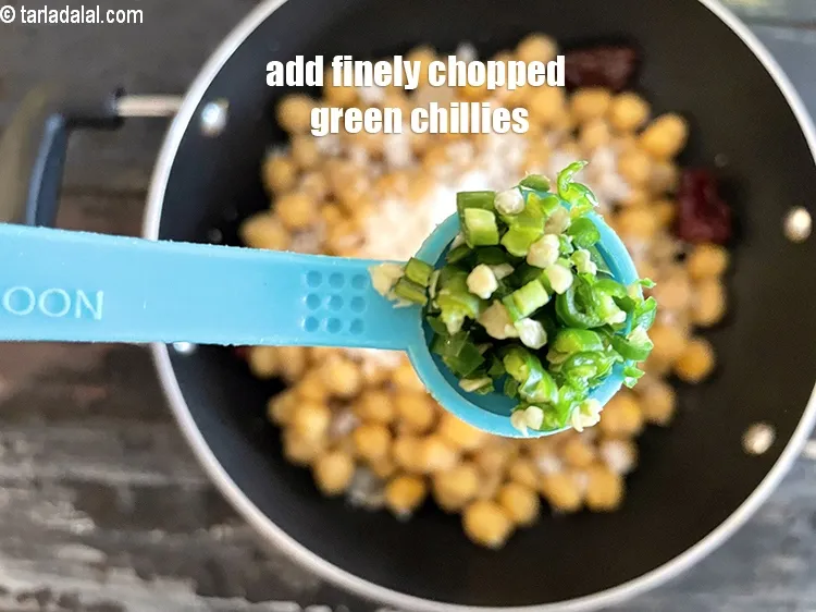 Step 24 – Add&nbsp;<meta charset="UTF-8" /><strong>1/2 tsp</strong>&nbsp;<a href="glossary-green-chillies-hari-mirch-331i">green chilli</a>&nbsp;, finely chopped.