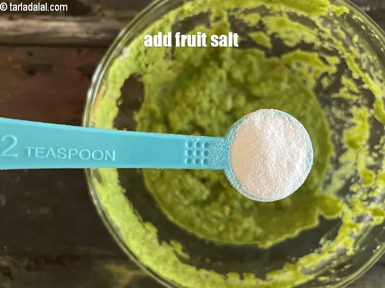 Step 18 – Add 1 tsp&nbsp;<a href="https://tarladalal.com/glossary-fruit-salt-420i">fruit salt</a>&nbsp;over the batter.
