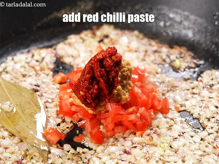 Step 13 – Add 1 tbsp red chilli paste.