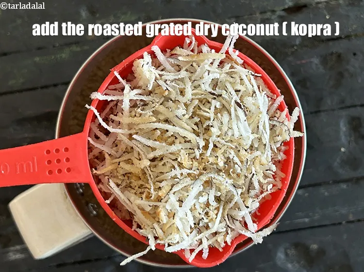 Step 13 – Add the roasted&nbsp;<a href="glossary-grated-dry-coconut-2272i">grated dry coconut (kopra)</a>.
