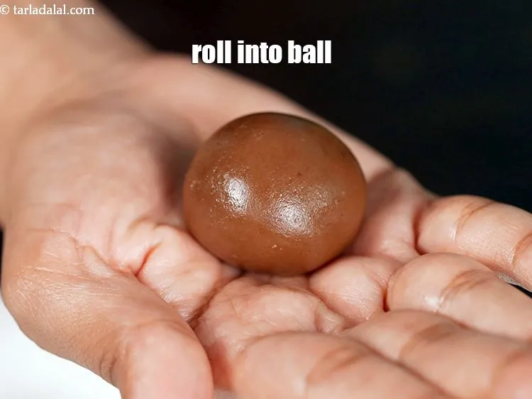 Step 13 – Divide the mixture into 10 equal portions and roll each portion into a ball.