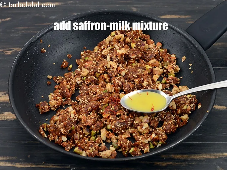 Step 13 – Switch off the flame, add the saffron-milk mixture.