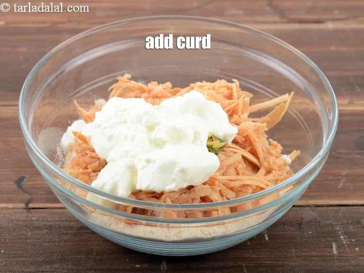 Step 13 – Add &frac12; cup <a href="https://www.tarladalal.com/glossary-curd-dahi-yogurt-yoghurt-383i">curd (dahi)</a>.