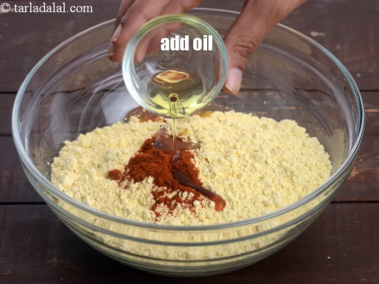 Step 15 – Add 1 tbsp&nbsp;<a href="https://tarladalal.com/glossary-oil-671i">oil</a>.&nbsp;