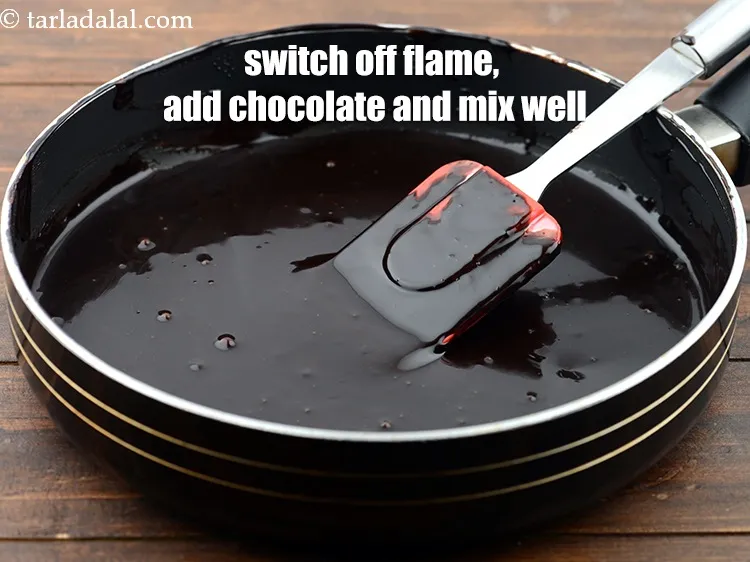 Step 13 – Switch off the flame, add the 1 cup&nbsp;<a href="https://www.tarladalal.com/glossary-melted-dark-chocolate-2477i">dark chocolate</a>&nbsp;and mix well till lumps free …