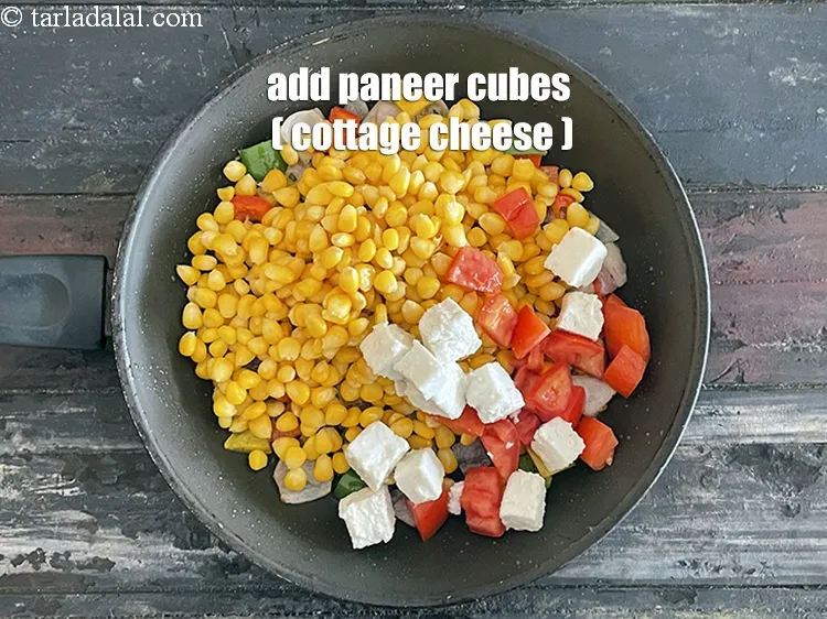 Step 20 – Add&nbsp;<meta charset="UTF-8" />1/4 cup&nbsp;<a href="glossary-paneer-cottage-cheese-chenna-985i">paneer (cottage cheese)</a>.