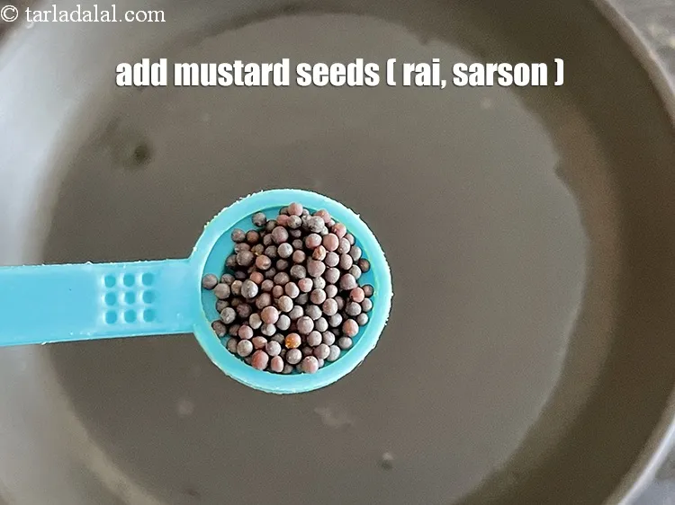 Step 13 – Add&nbsp;<meta charset="UTF-8" />1 tsp&nbsp;<a href="glossary-mustard-seeds-sarson-rai-sarson-ke-beej-525i">mustard seeds ( rai / sarson)</a>.
