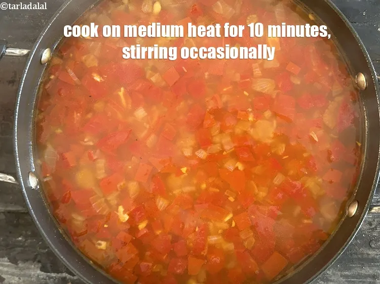 Step 20 – <meta charset="UTF-8" />Cook on a medium flame for 10&nbsp;minutes, while stirring occasionally.&nbsp;