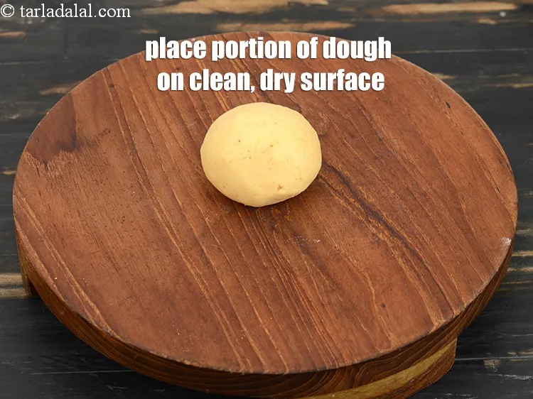 Step 13 – Place a portion of the dough on a clean, dry surface.