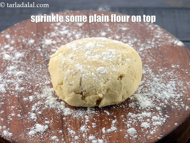 Step 13 – Sprinkle some plain flour on top.