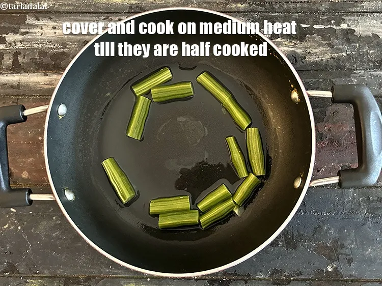 Step 13 – Cover and cook on a medium flame <strong>till they are half done. It is important …