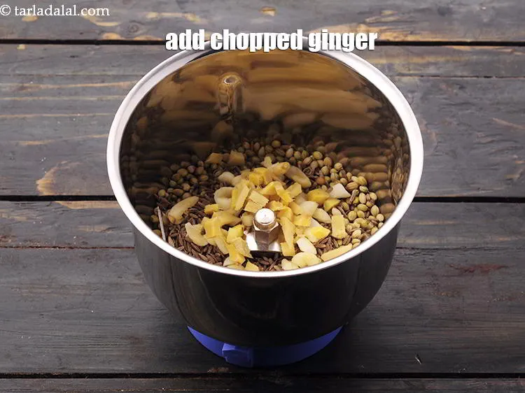 Step 20 – Add <a href="https://www.tarladalal.com/glossary-ginger-adrak-453i#ing_786" target="_blank">chopped ginger</a>. To make jain version omit ginger.