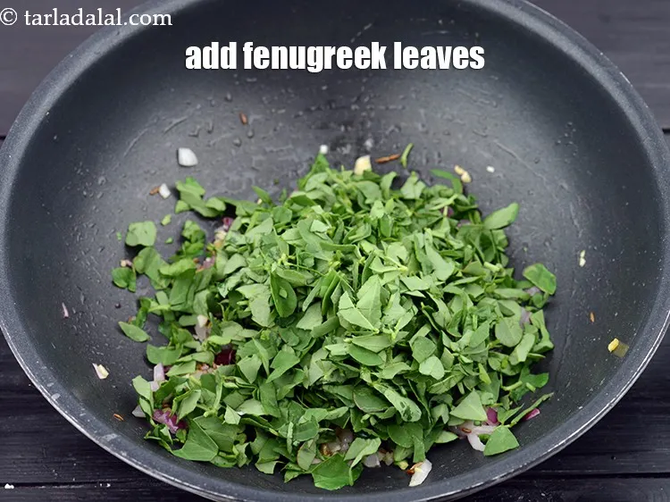 Step 13 – Add the 1/2 cup&nbsp;<a href="https://www.tarladalal.com/glossary-chopped-fenugreek-811i">chopped fenugreek (methi) leaves</a>.&nbsp;