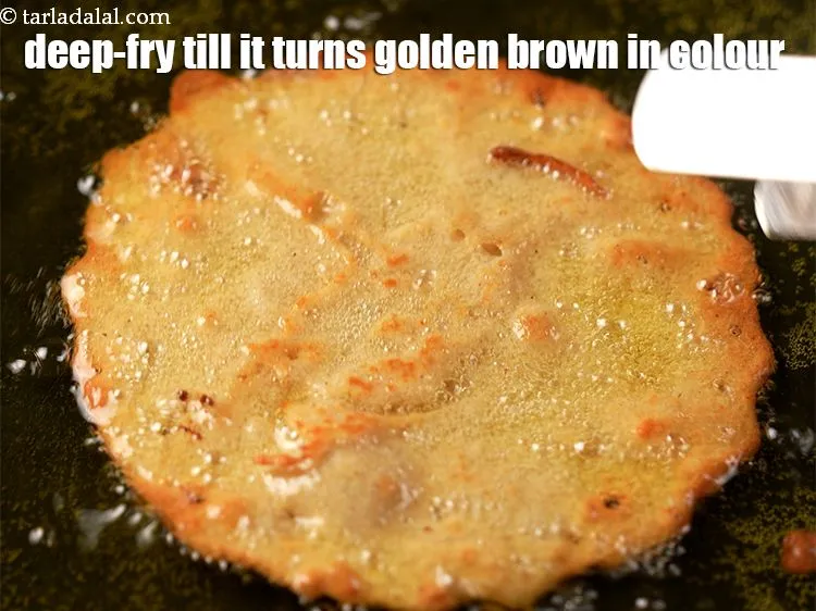 Step 19 – Deep-fry on a medium flame till it turns golden brown in colour from both the …