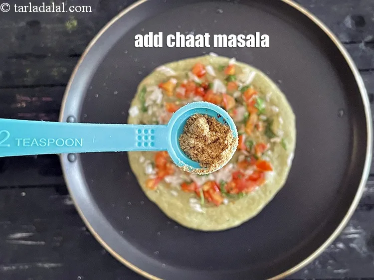 Step 45 – Sprinkle a little chaat masala.