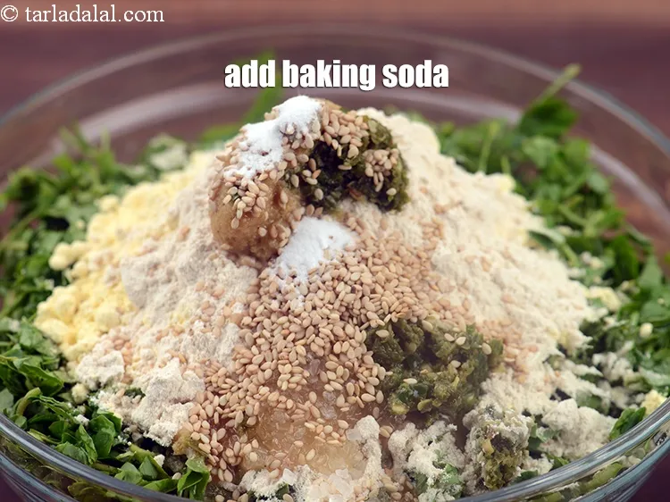 Step 13 – Add 2 pinches of baking&nbsp;<a href="https://www.tarladalal.com/glossary-baking-soda-soda-bi-carb-615i">soda</a>.