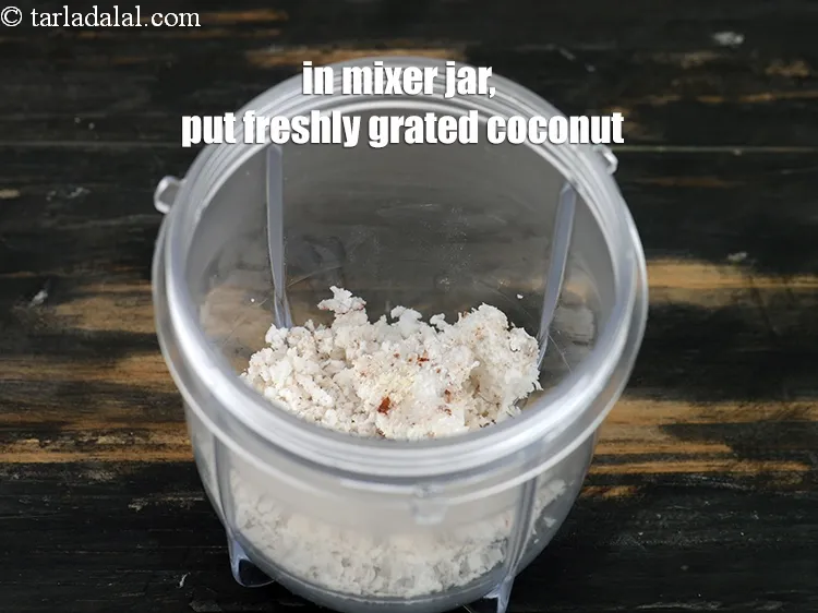 Step 13 – In a mixer jar, put 2 tbsp&nbsp;freshly&nbsp;<a href="https://tarladalal.com/glossary-grated-coconut-852i">grated coconut</a>.&nbsp;