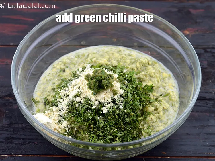 Step 13 – Add 1 tsp&nbsp;<a href="https://www.tarladalal.com/glossary-green-chilli-paste-hari-mirch-ki-paste-mirchi-paste-333i">green chilli paste</a>.&nbsp;