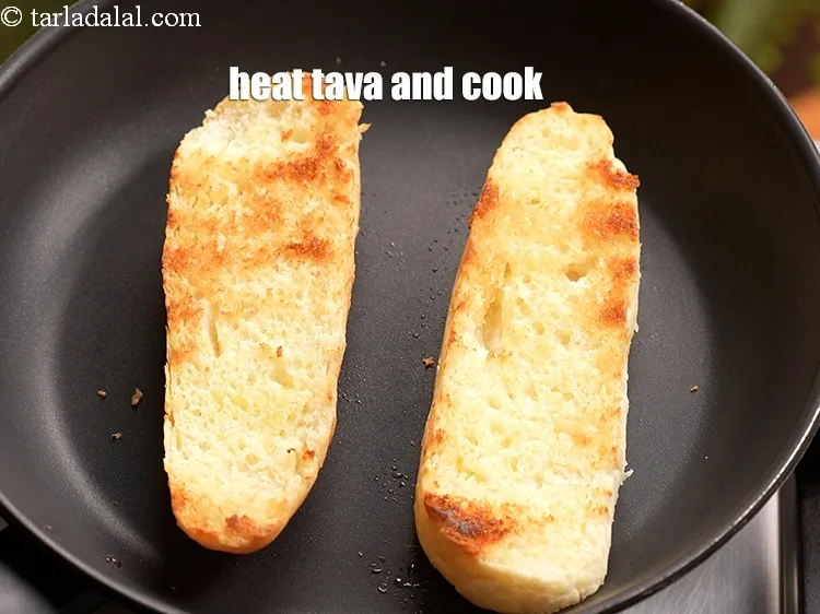 Step 13 – Heat a non-stick tava (griddle) and cook both the halves till they turn light brown …