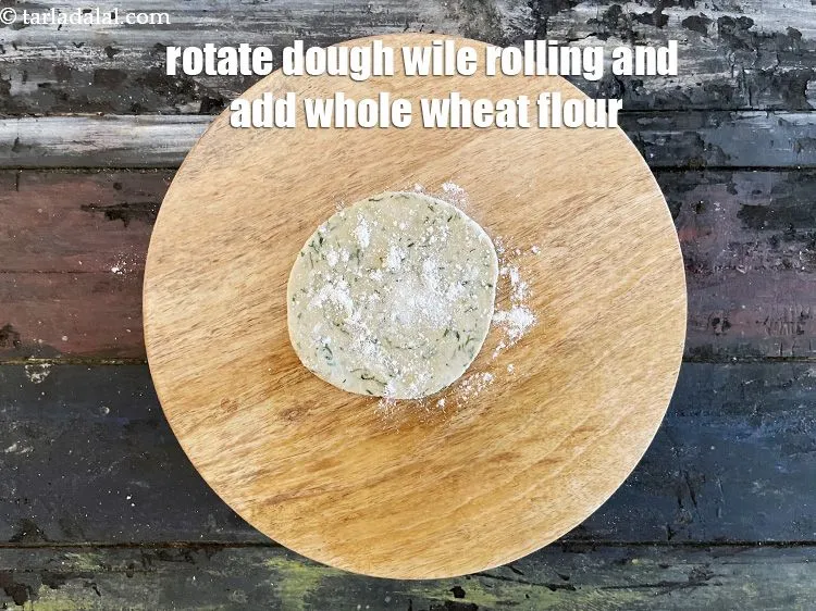 Step 15 – As you roll the dough, you will need to rotate it and sprinkle whole wheat …