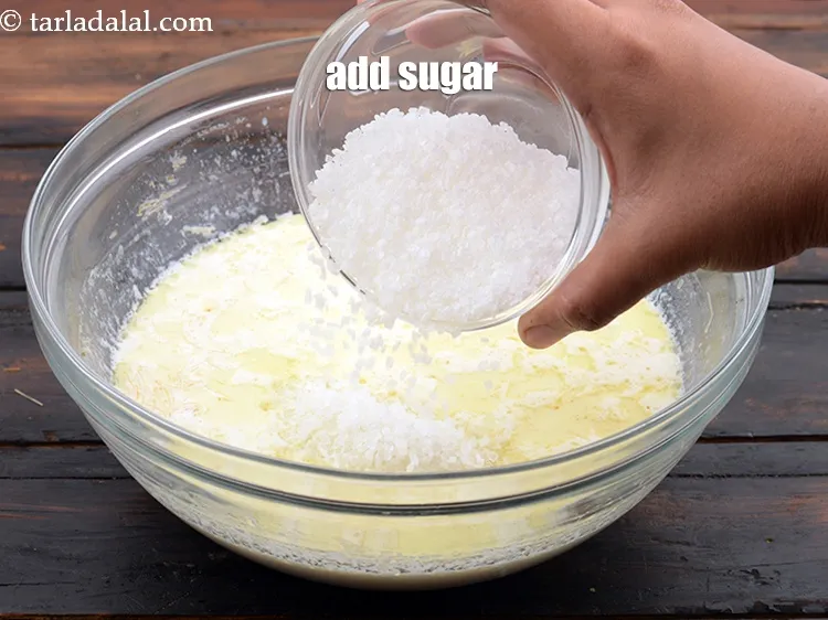 Step 12 – Add 1/2 cup&nbsp;<a href="https://www.tarladalal.com/glossary-sugar-chini-shakkar-278i">sugar</a>.