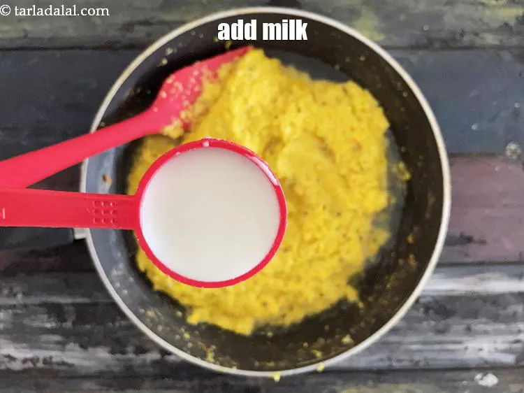 Step 16 – Add&nbsp;<meta charset="UTF-8" />2 tbsp&nbsp;<a href="glossary-milk-doodh-full-cream-milk-514i">milk</a>.