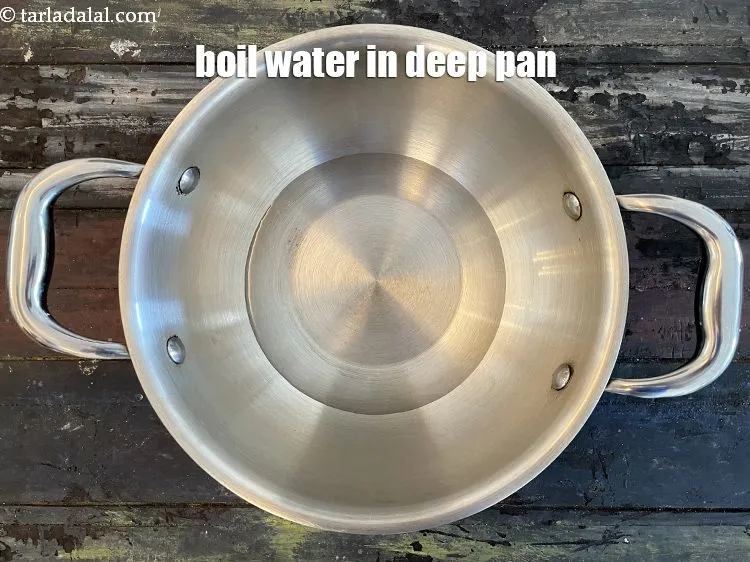 Step 13 – <meta charset="UTF-8" />Boil &frac12; cup of water in a kadhai.