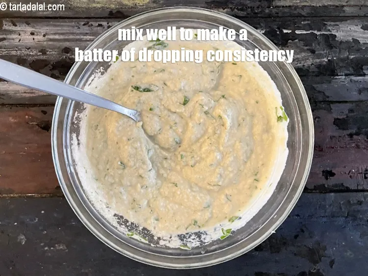 Step 19 – Mix well to make a batter of dropping consistency.