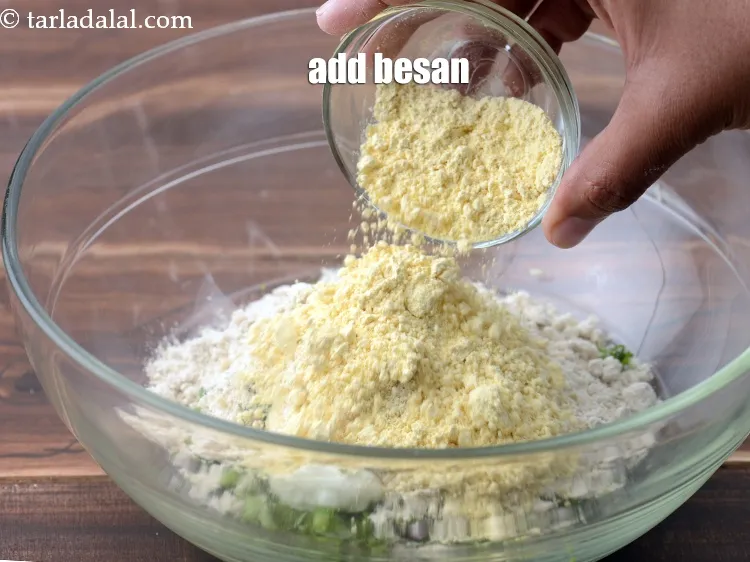 Step 13 – Add 1/2 cup <a href="https://www.tarladalal.com/glossary-besan-chana-dal-flour-bengal-gram-flour-952i">besan (bengal gram flour)</a>.