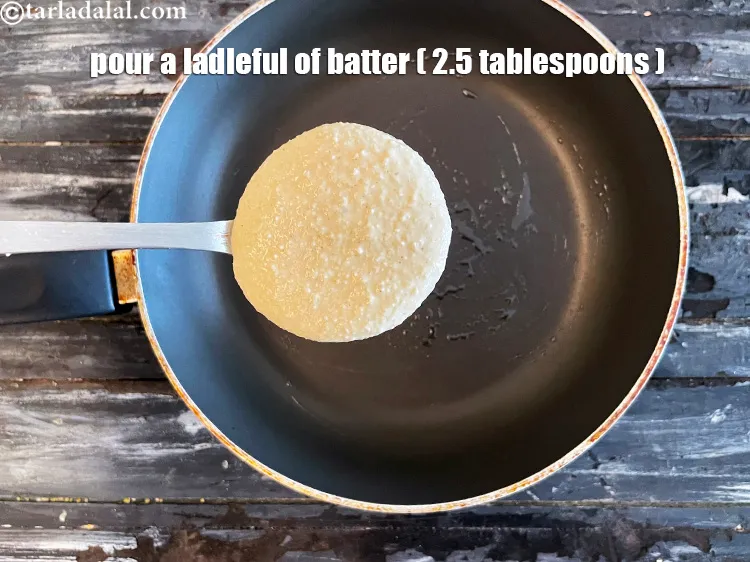 Step 19 – Pour a ladle of batter on it ( we used 2 1/2 tablespoons of batter).