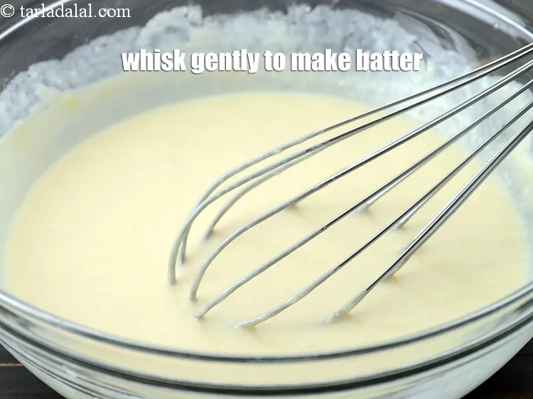 स्टेप 13 – मिश्रण बनाने के लिए इसे धीरे से फेंटें।