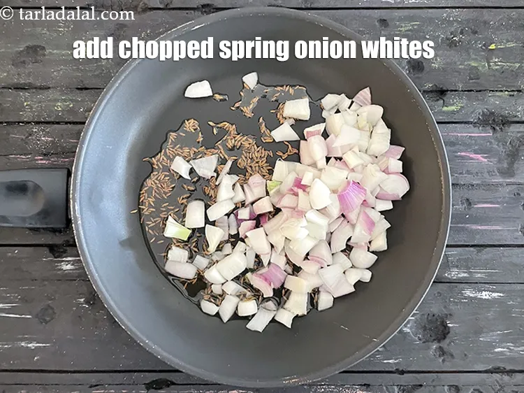 Step 15 – Add&nbsp;<meta charset="UTF-8" />1 cup&nbsp;<a href="glossary-chopped-spring-onion-whites-815i">chopped spring onions whites</a>.