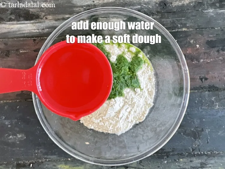 Step 13 – Add enough water to make a soft dough. We added xx tablespoons of water.