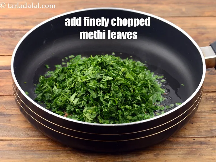 Step 14 – When the seeds crackle, add 1 cup&nbsp;finely&nbsp;<a href="https://www.tarladalal.com/glossary-chopped-fenugreek-811i">chopped fenugreek (methi)</a>&nbsp;leaves. Fresh methi leaves tastes the …