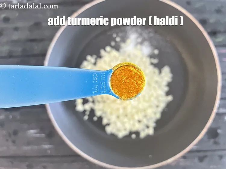 Step 14 – Add&nbsp;<meta charset="UTF-8" />1/4 tsp&nbsp;<a href="glossary-turmeric-powder-haldi-645i">turmeric powder (haldi)</a>.