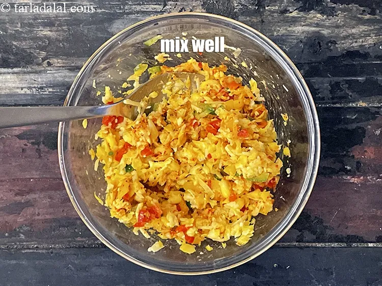 Step 22 – Mix well. Stuffing for&nbsp;corn capsicum cheese paratha.