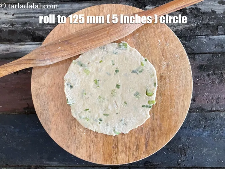 Step 16 – Roll each portion into a 125 mm. (5") diameter circle using a little whole wheat …