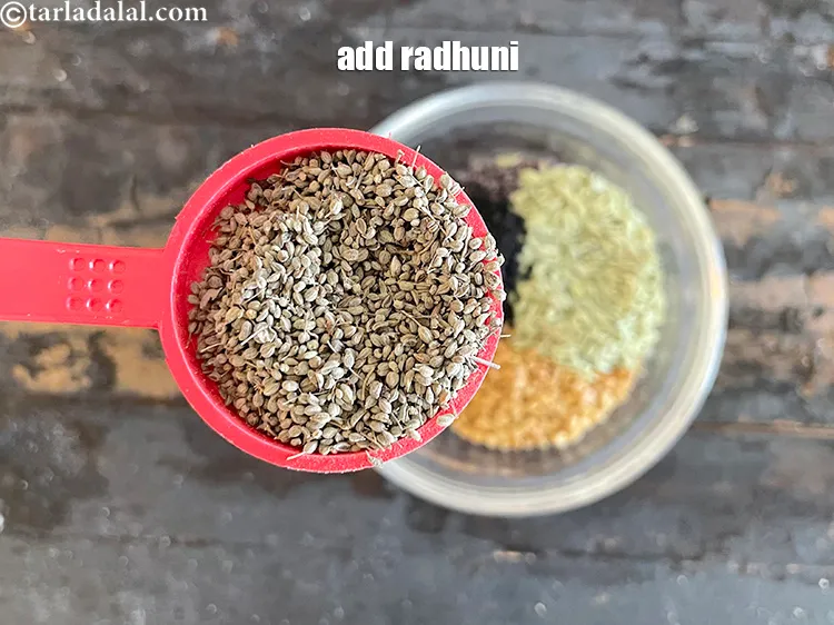 Step 25 – Add 1 tbsp radhuni.